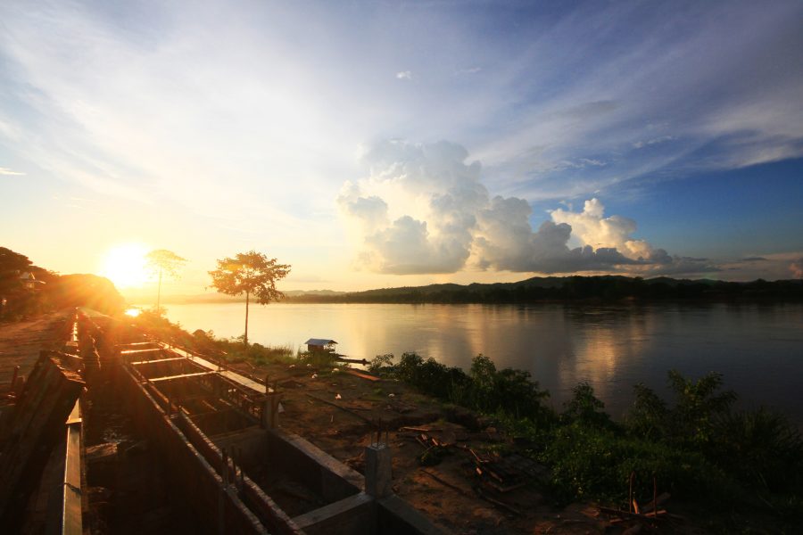 Beautiful silhouette Sunrise and sunset is twilight on the sky and reflections in the Mekong River is Thai-Laos border at Chaingkhan distric Thailand