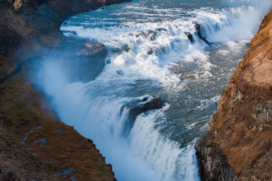 Panoramic summer view of popular tourist destination - Gullfoss waterfall in Iceland. Dramatic aerial view on Hvita river. Incredible morning scene of Iceland, Europe.