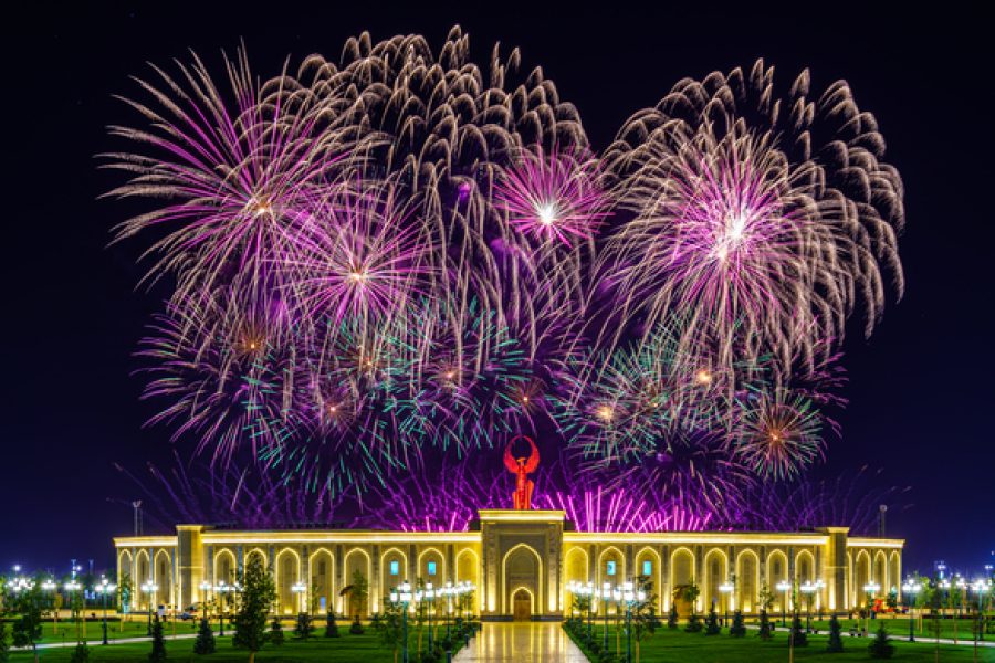 Uzbekistan, Tashkent - September 1, 2023: Multi-colored fireworks over the Independence Monument in Yangi Uzbekistan Park in Tashkent on Independence Day at night.